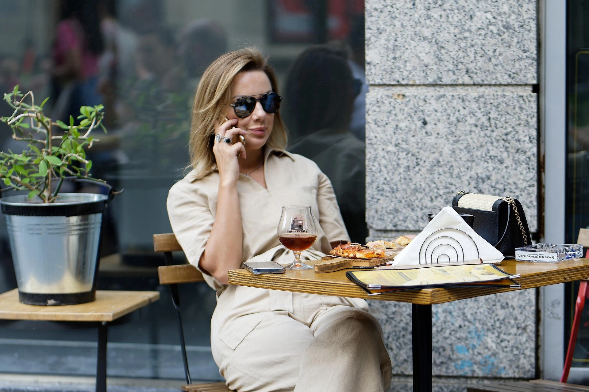 woman enjoying solo travel at a local café