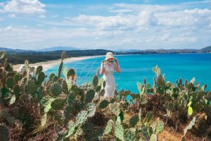 woman enjoying freedom during a solo travel adventure